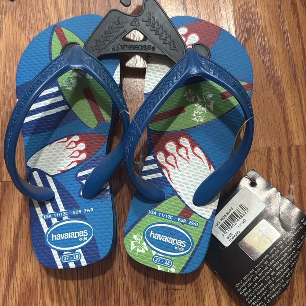 Children’s Havaianas new with tags size 11/12C Blue surfer surfboards
